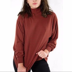 Red and brown/tan striped turtleneck sweater